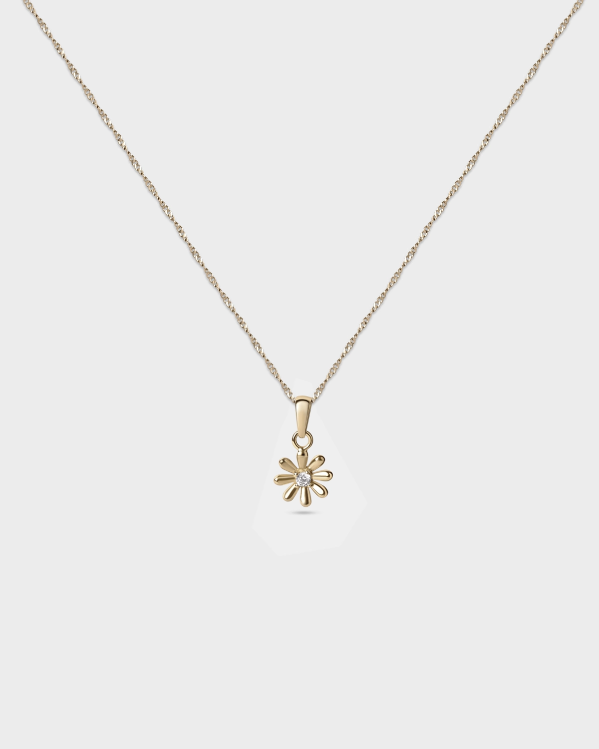 colgante flor dorado pequeño para mujer de aurazzure