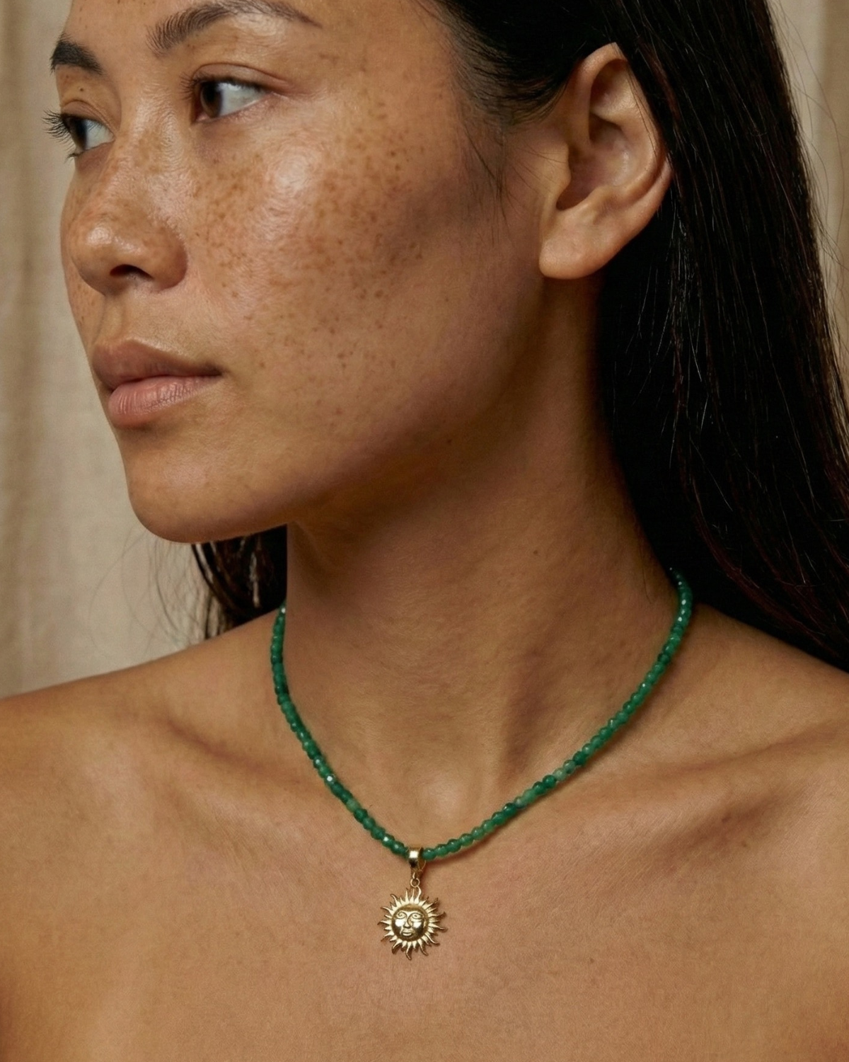 Aurazzure green sun necklace